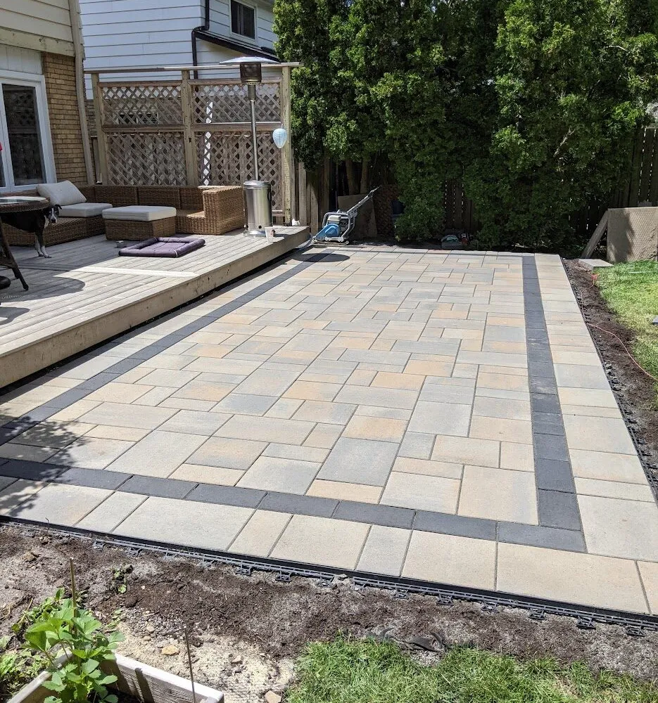 An interlock backyard patio