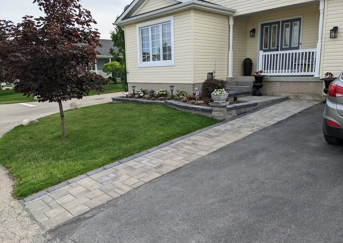 Paver patio installation in progress used as a generic service process reference.
