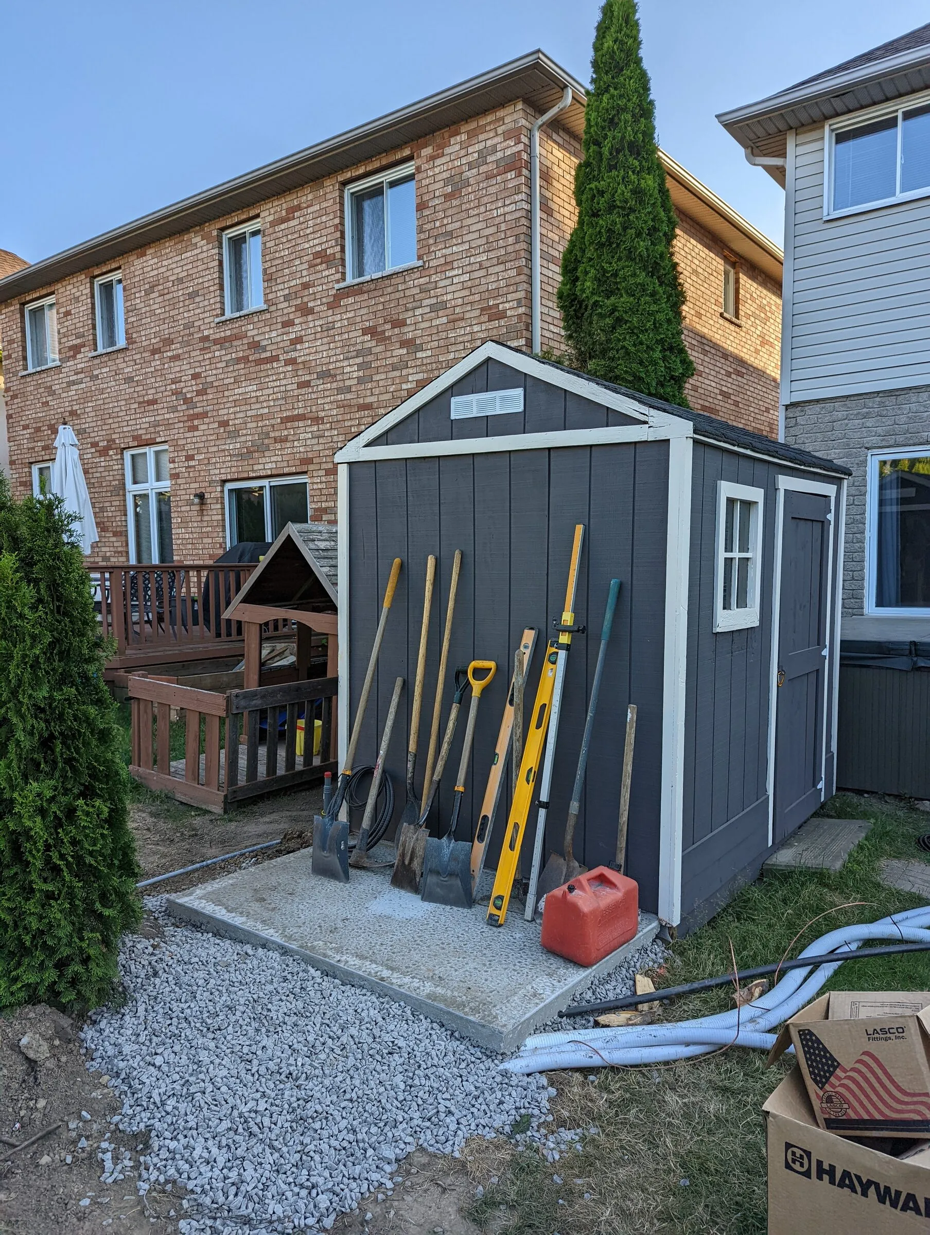 Clean hardscaping job site with organized tools and materials