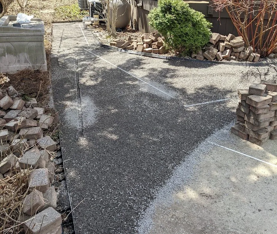 Bedding preparation used as a generic reference for paver repair leveling.